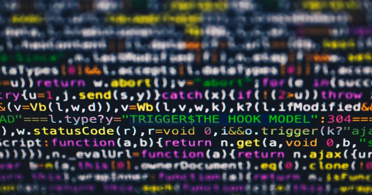 Pantalla con código de inteligencia artificial y banderas de China y Estados Unidos